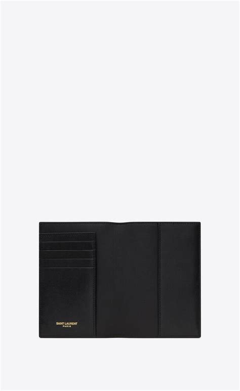 ysl passport case in black|TINY CASSANDRE passport case in grained leather .